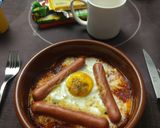 Foto del paso 7 de la receta Huevos al horno con salchichas y mostaza