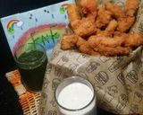 A picture of step 5 of Cfc crispy fry chicken.