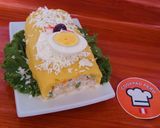 A picture of step 4 of Causa Rellena with Tuna Chunks.