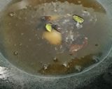 A picture of step 2 of Zarda with baby gulab jamuns.