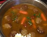 A picture of step 4 of Beef Meatballs bathed with Veggies Sauce.