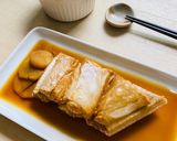 A picture of step 3 of Simmered Leather Jacket in ginger soy sauce.