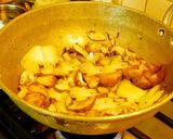 A picture of step 5 of Ravioli (cheese and spinach stuffed Ravioli) Mushroom cream sauce.