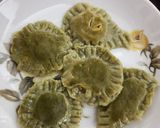 A picture of step 12 of Spinach Corn Ravioli in white sauce.