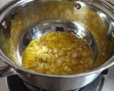 A picture of step 2 of Arhar Moong Masoor Dal Tadka.