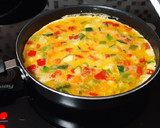 Foto del paso 3 de la receta: Tortilla de pimientos, calabacín y zanahoria