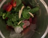 A picture of step 1 of Strawberry Mint And Ginger Spritzer.