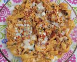 A picture of step 7 of Chicken fettuccine creamy pink pasta.