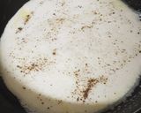 A picture of step 2 of European omelet with brown bread.