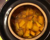 A picture of step 3 of California Farm Green Mangos Pickled in Pepper Oil.