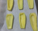 Foto del paso 6 de la receta: Calabacines gratinados y rellenos de jamón cocido y pipas