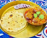 A picture of step 6 of Rajsthani (jaipuri)sabut pyaz ki sabji and tikkad.