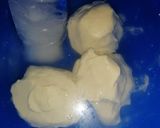 A picture of step 4 of Homemade Butter (and buttermilk) recipe.