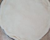 A picture of step 10 of Dilkush or sweet bread with coconut and tutti frutti filling.
