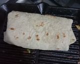 A picture of step 6 of Chicken Achari Wraps.