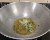 A picture of step 3 of Sem Aloo with Kalonji Seeds.