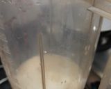 A picture of step 2 of Strawberry crushed milk shake with vanilla ice cream.