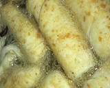 A picture of step 8 of Fishroll with bread crumbs.