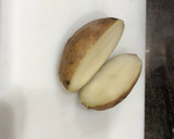 Foto del paso 8 de la receta: Paletilla de cordero al horno con cabeza de ajos y patata al horno