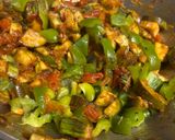 A picture of step 2 of Brinjal and Capsicum Masala.