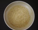 A picture of step 1 of Tomato Juice Biryani.