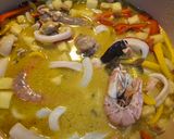 A picture of step 6 of Thai Pineapple Curry with Seafood.
