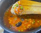 A picture of step 7 of Tomato rice in pan.
