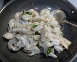 A picture of step 1 of Prawns onion tomato masala.