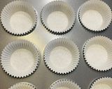 A picture of step 8 of Banana White Chocolate chips Cupcake with Citrus Buttermilk Frosting.