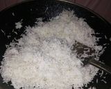 A picture of step 2 of Bengali style coconut laddu.