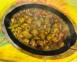 A picture of step 10 of Kung pao chicken with egg fried rice.