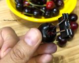 A picture of step 4 of #HowTo “Pit Cherries” with a binder clip? - Tuesday Tip.
