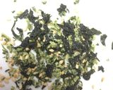 A picture of step 2 of Egg Onigiri (Rice ball).