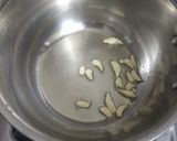 A picture of step 1 of Roasted garlic green peas soup.
