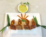 Hình bước làm 8 của món Xôi gấc cuộn chả chay