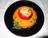 A picture of step 5 of Red bell peppers stuffed with oregano chicken on sweet potatoes puree.