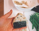 A picture of step 3 of Umeboshi onigiri/ plum rice ball.
