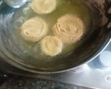A picture of step 9 of Seven layered puris.