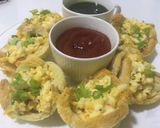 A picture of step 9 of Egg-cheese salad in bread cups.