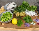 A picture of step 1 of Pan-fried Halibut, Jersey Royals, Herb and Legume Crush.