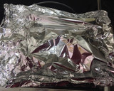 Foto del paso 5 de la receta: Lubina al papillote en horno sobre cama de pimiento amarillo