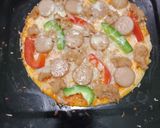Foto langkah ke 5 dari resep Pizza ekonomis praktis.