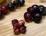 A picture of step 6 of #HowTo “Pit Cherries” with a binder clip? - Tuesday Tip.
