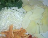 A picture of step 2 of White fried rice with potato and vegetable soup.