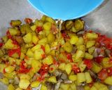 A picture of step 7 of Meaty plantain stuffed bell pepper.