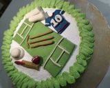 A picture of step 15 of Cricket 🏏 theme cake.