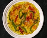 A picture of step 3 of Green chutney peri peri veg uttapum.