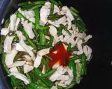 A picture of step 4 of French beans chicken and veg fried rice.