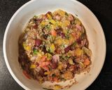 A picture of step 6 of Mexican quinoa salsa in cucumber pockets.