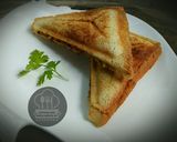 A picture of step 5 of Jhatphat omelette sandwich.